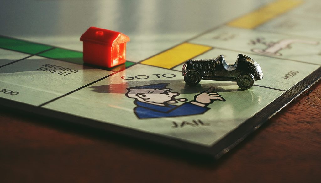 Playing games like Monopoly (a modified, easier version) can help your children understand the value of money. Photo by Suzy Hazelwood