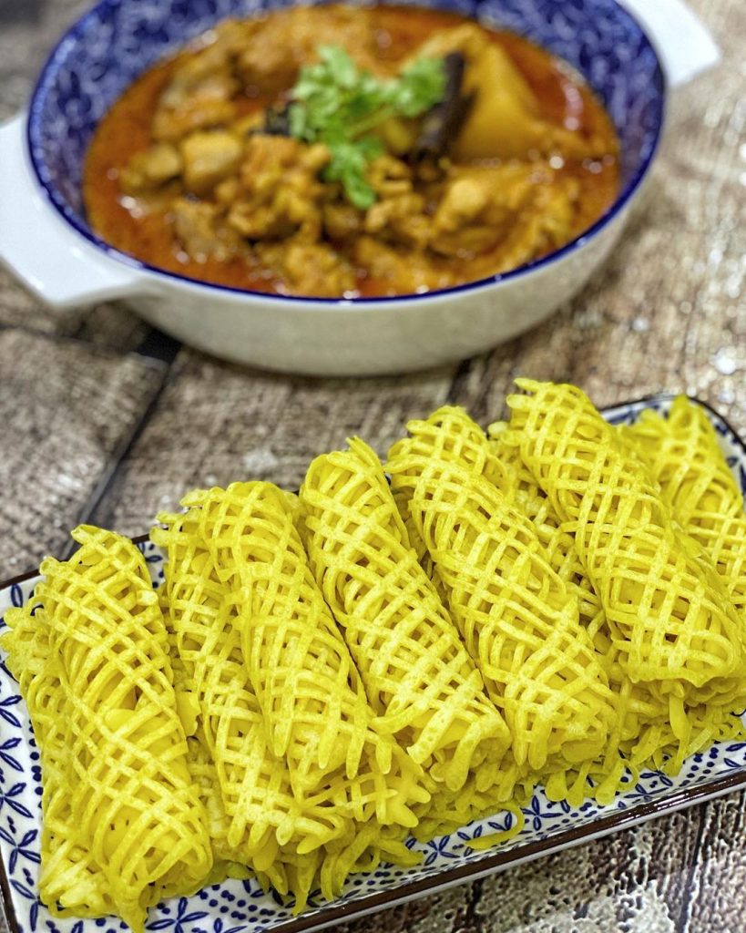 These lacy pancakes, or roti jala, are a popular dish in Malaysia, Indonesia and Singapore, and served with chicken curry. Image credit: salizisa