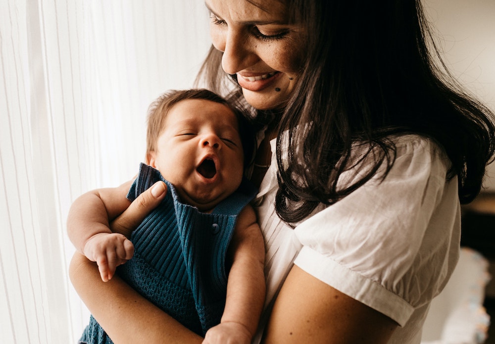 Responding to and taking care of your baby can strengthen the mother-child bond and help you feel better and more confident. Image credit: Jonathan Borba