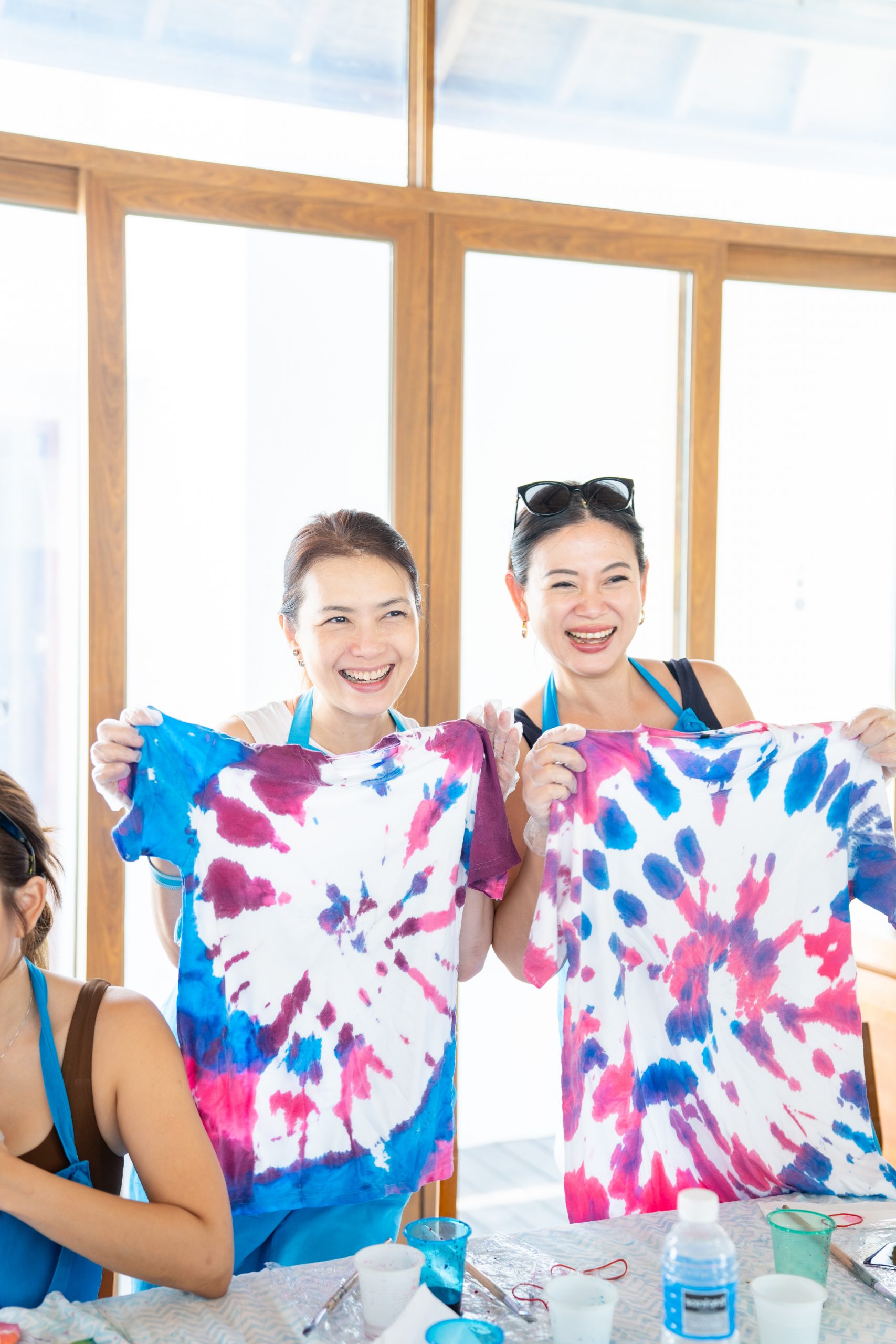 Ching Lin and Tjin with matching tie-dye shirts