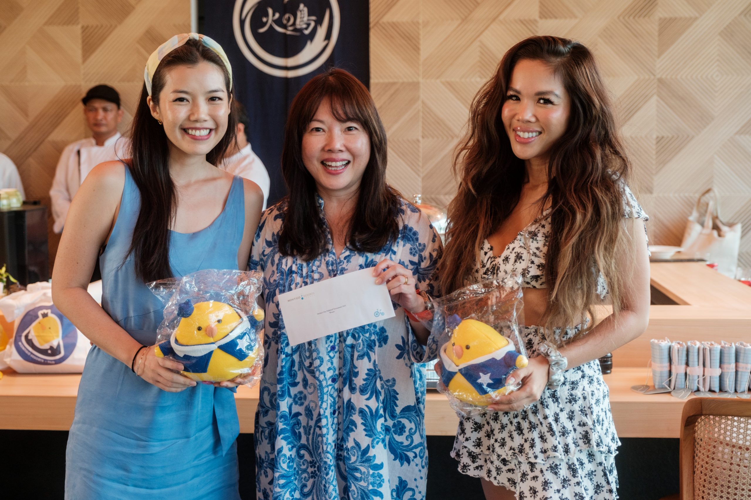 Leny awarding Priscilla and Helen with the grand prize - Montigo stays - for winning the pickleball tournament.