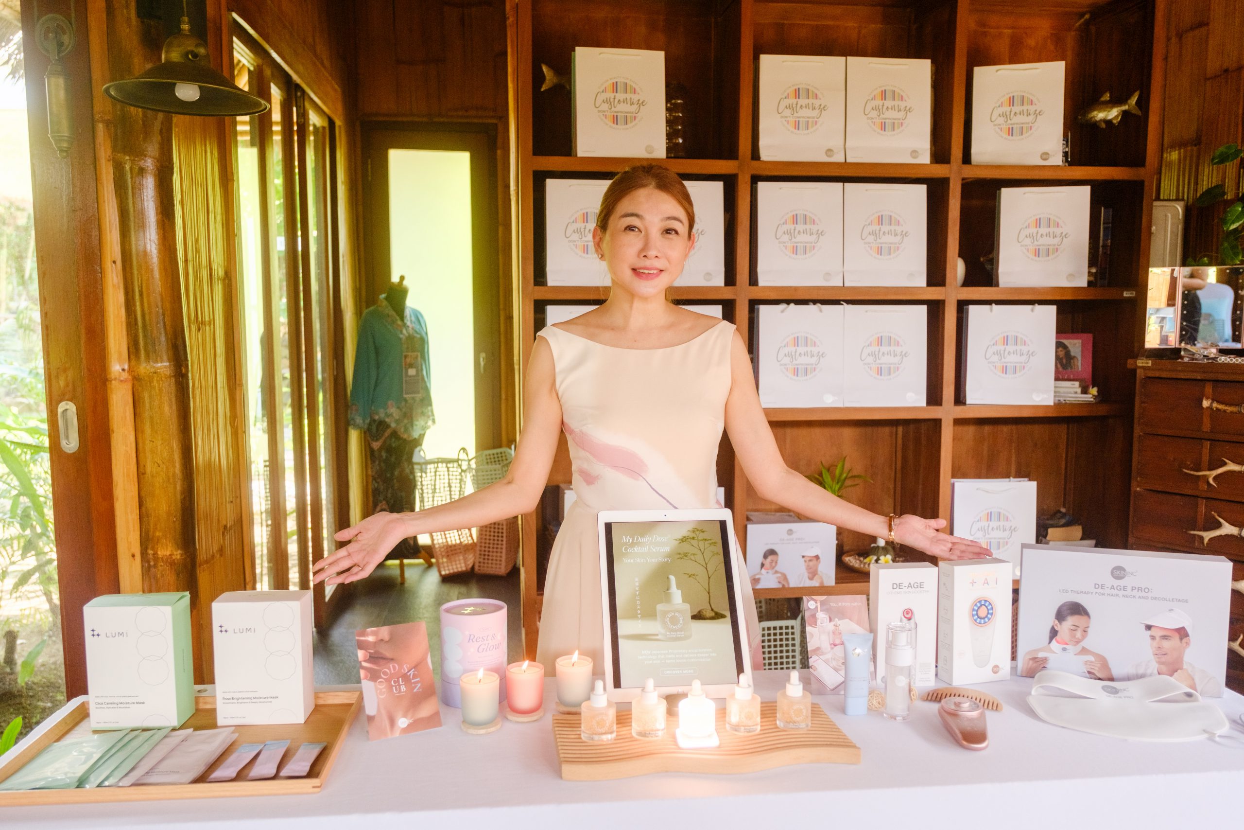 Sabrina showcasing Skin Inc's best-selling products, including their newly redesigned serums.