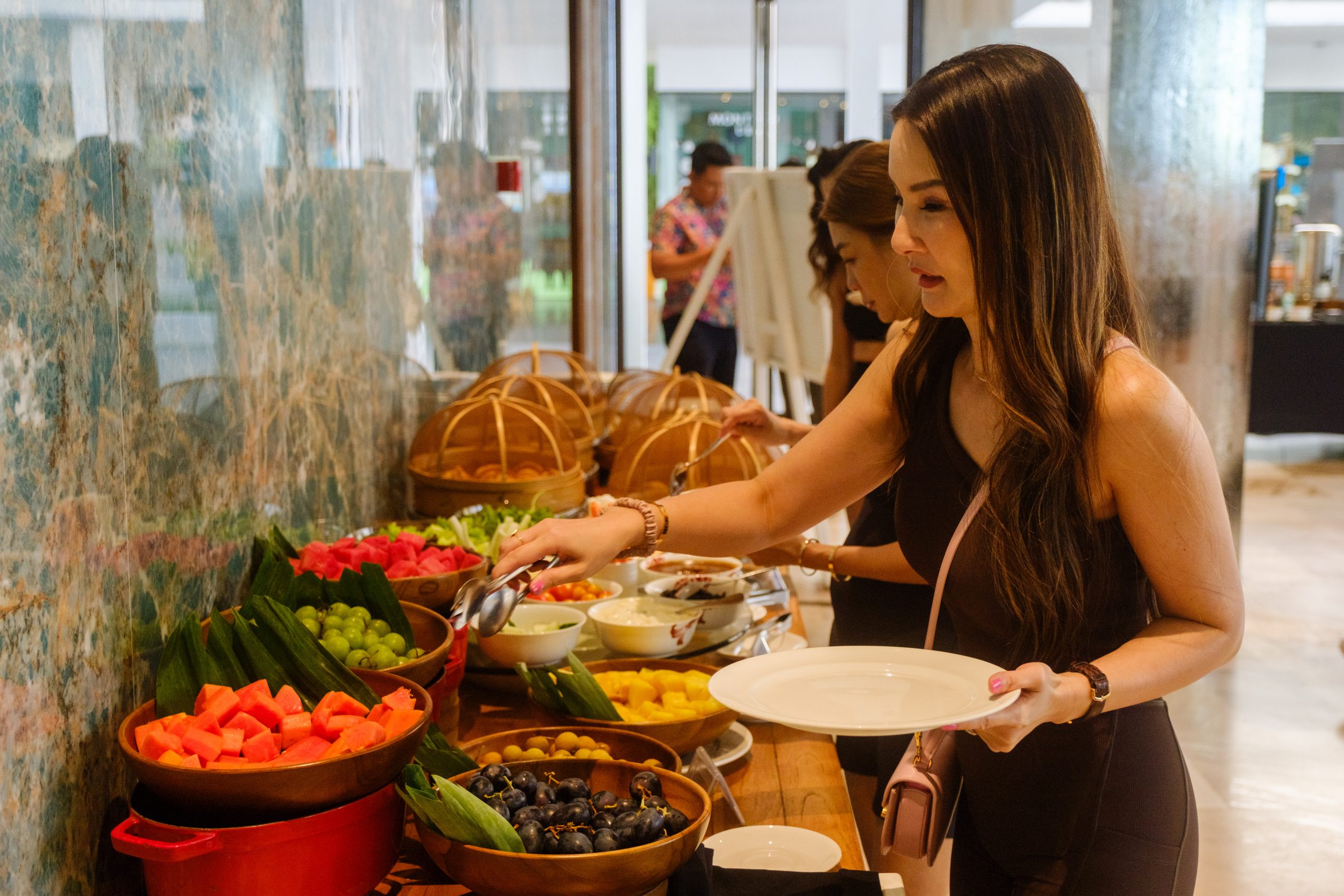 Guests like Samantha could choose from a variety of fruits to pair with their overnight oats and smoothie bowls.