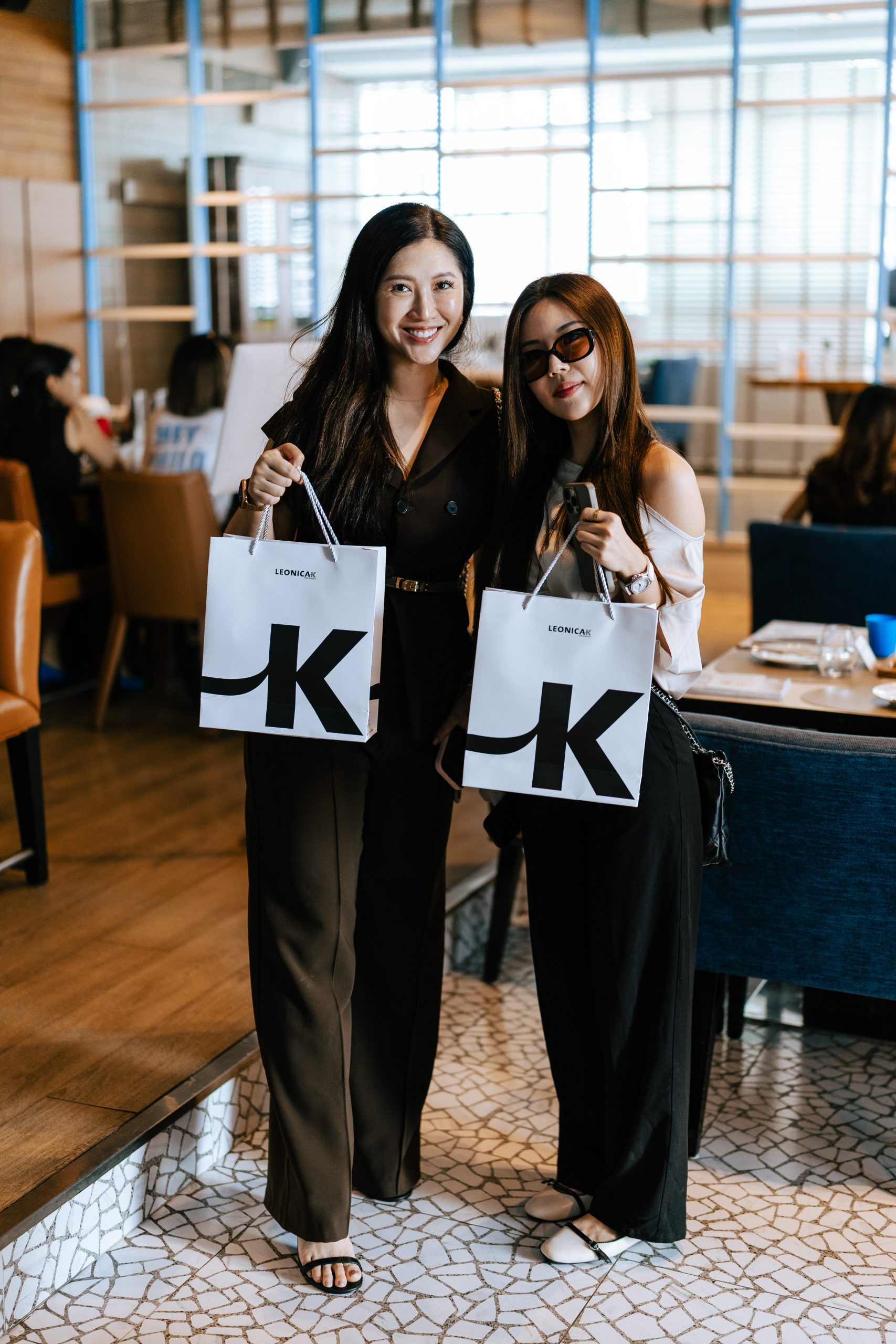 < a href="https://www.instagram.com/hanniwongs/">Hanni Wong and Lizy Teo